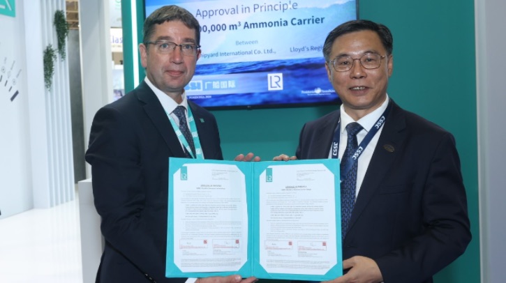 The image shows Nick Brown, CEO of Lloyd’s Register, and Chen Ji, chairman of GSI, at the ceremony during Posidonia 2024 holding their joint development project agreement.