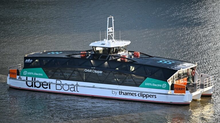 The Orbit Clipper, the UK first fully electric zero-emissions ferry, completed its first passenger trip across the River Thames on December 5. It is pictured here with a white hull and a black and green livery.