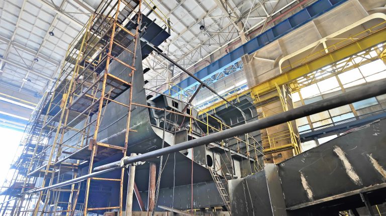 Ship building and scaffolding in a shipyard.