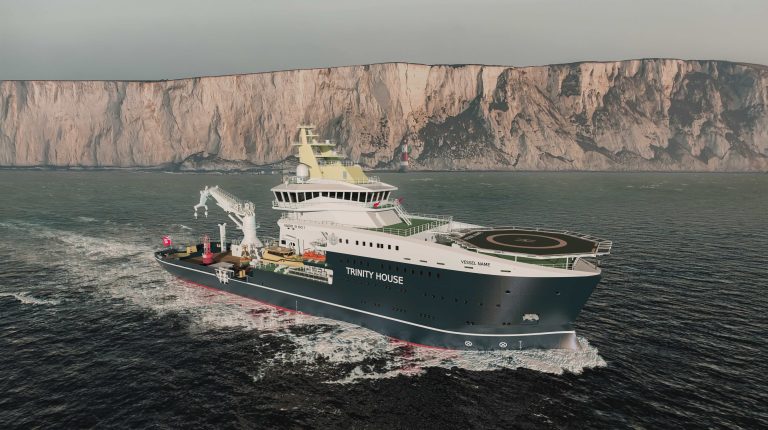 Digital render of the Vard 9 601 that will be built for for Trinity House. The vessel is sailing through choppy dark waters with a high-cliff coastline in the background.