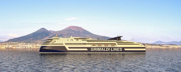 AYK Energy’s OrionAN batteries selected for Grimaldi ro-pax fleet A Grimaldi Lines ferry sails through calm seas with a mountain in the background.