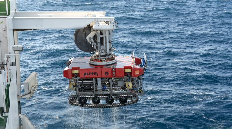 Global Marine selects Orange Marine’s Alpha ROV for new cable maintenance vessel Orange Marine’s Alpha ROV is lowered from a ship into the water.